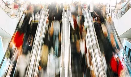 busy escalator in public space