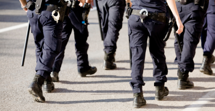 police officers walking down a street