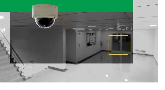 security surveillance camera overlooking the lobby of a building entrance