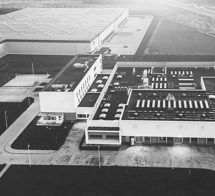 aerial view of factory in black and white