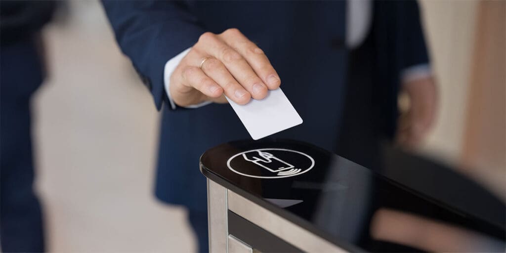 Business professional scanning a security access card