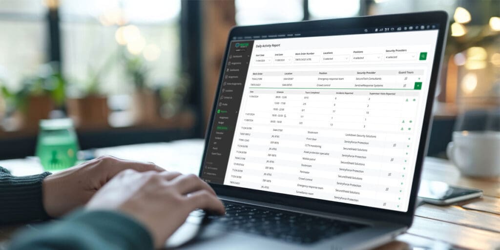 Close-up of a person working on a laptop displaying a detailed Daily Activity Report dashboard
