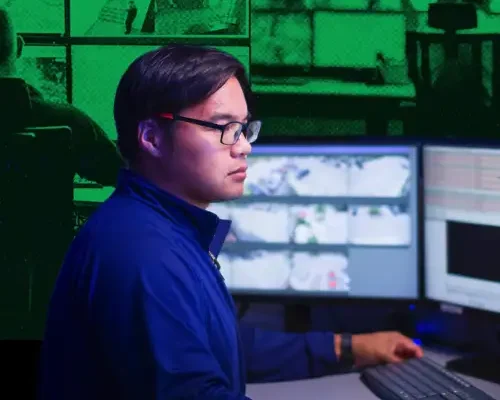 security guard working on computer